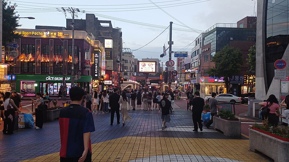 Crowded Hongdae nightlife street in Seoul at night