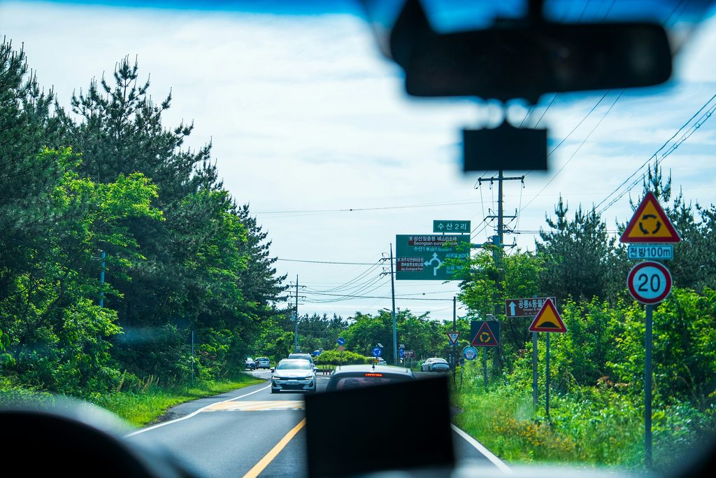 Jeju transportation by car on a road in Seongsan-eup, Jeju Island