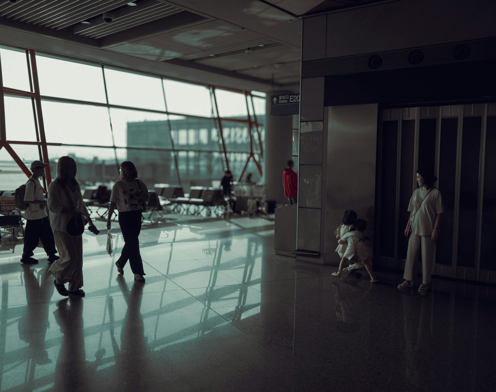 Travelers walking through Incheon International Airport in South Korea