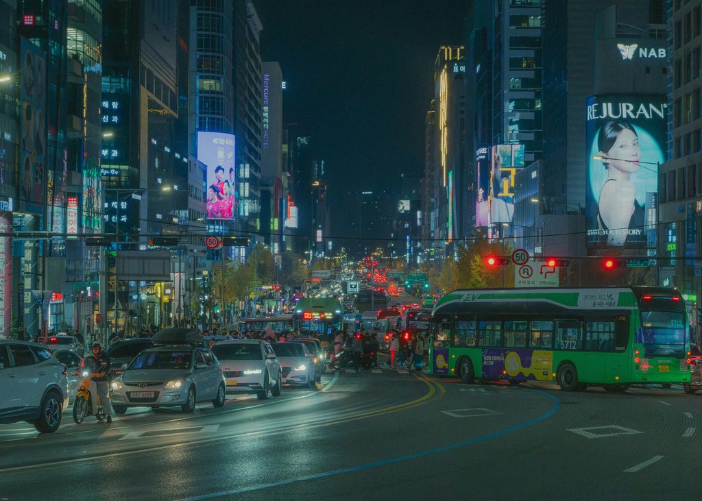 Late-night traffic near Hongdae Station in Seoul