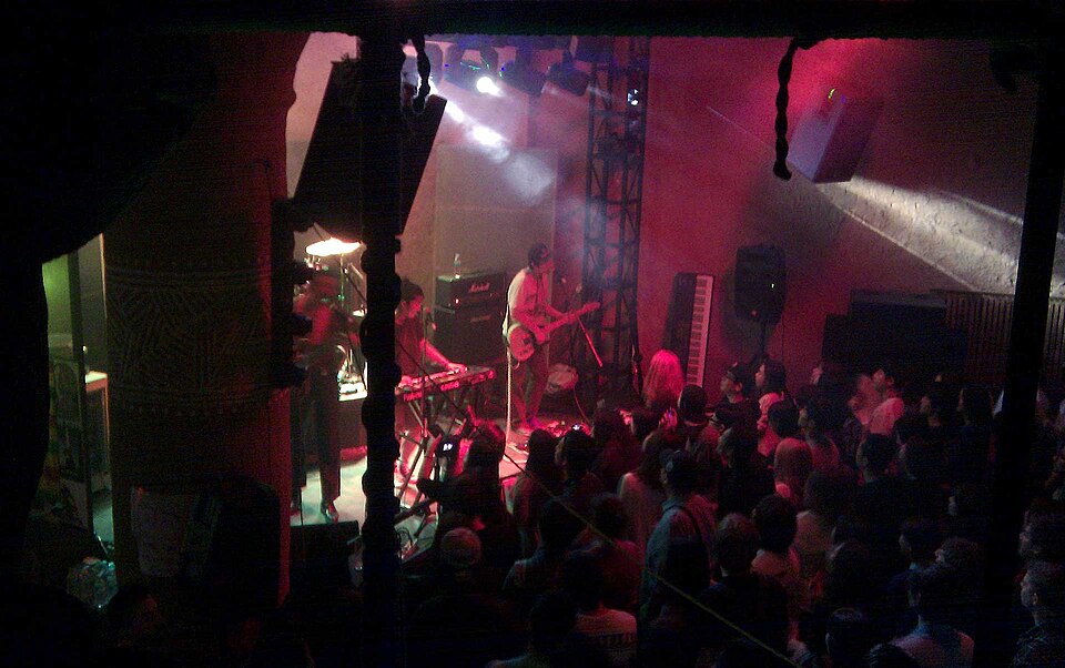 Live band performing at a music club in Hongdae, Seoul