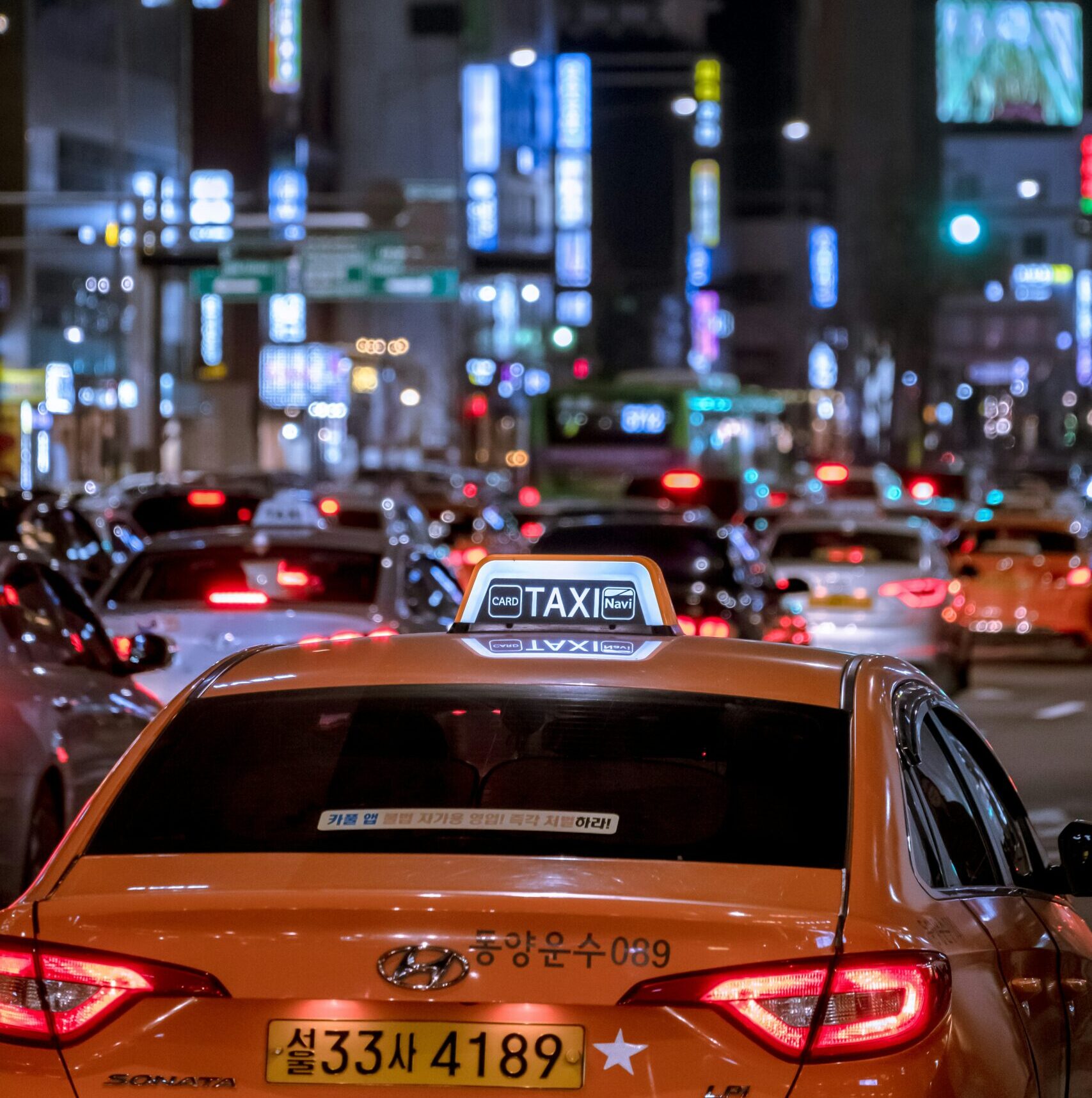 Taxi driving on a street in Seoul, South Korea