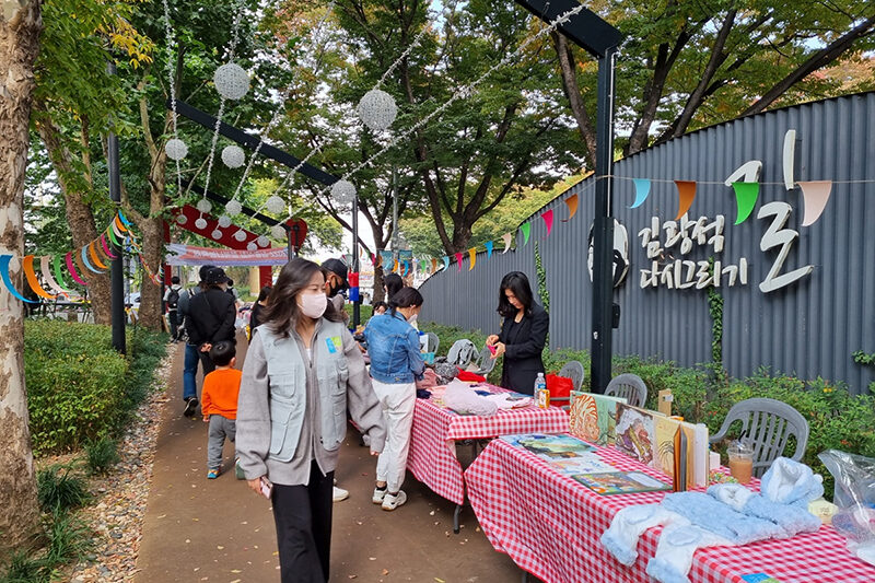 Visitors walking along Kim Kwangseok-gil Street in Daegu, South Korea