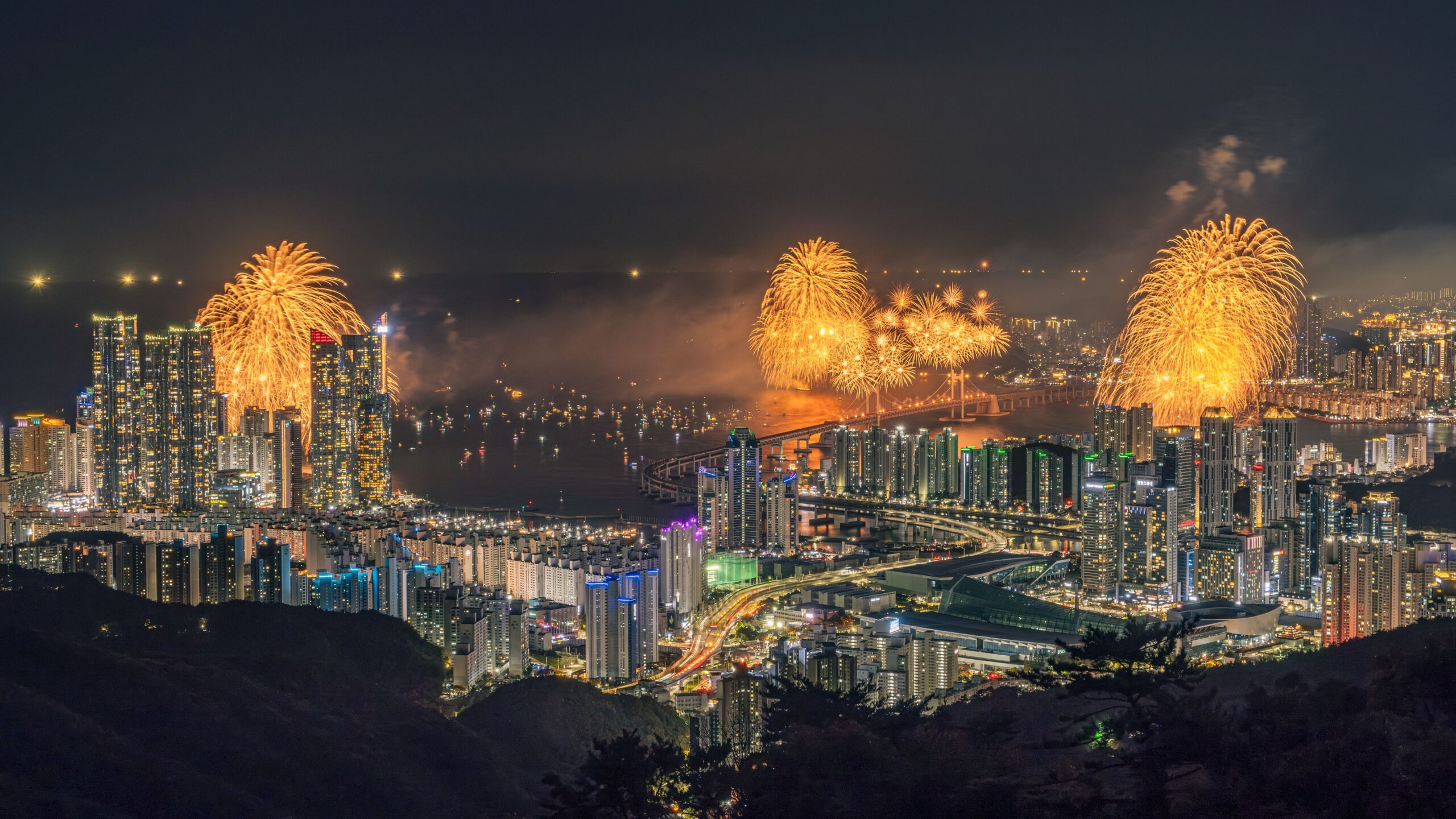 Busan Fireworks Festival 2026 over the Busan skyline at night