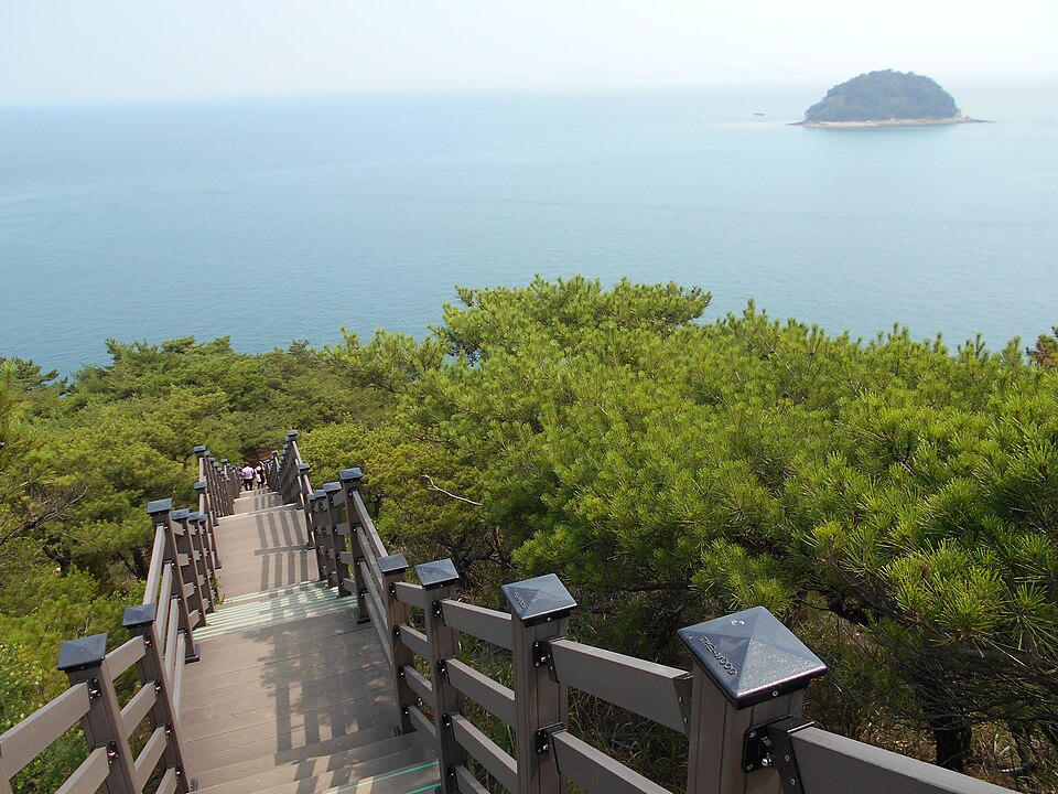 Wooden stairs along the coastal walking trail on Somuuido Island, Incheon